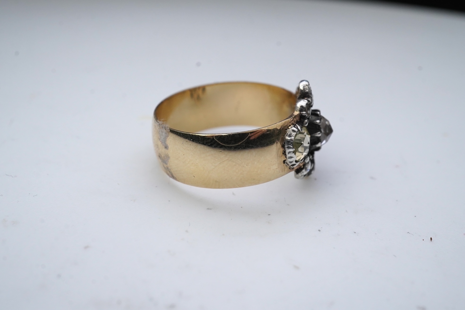 A gold and diamond ring